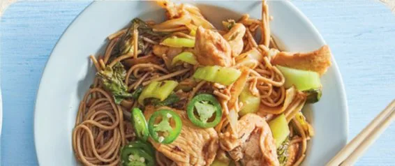 Stir-fried yaki soba noodles with chicken, bok choy and jalapeño
